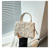 去除图片英文字母 (16) Stylish plush women's shoulder bag with a premium feel; doubles as a versatile crossbody bag
